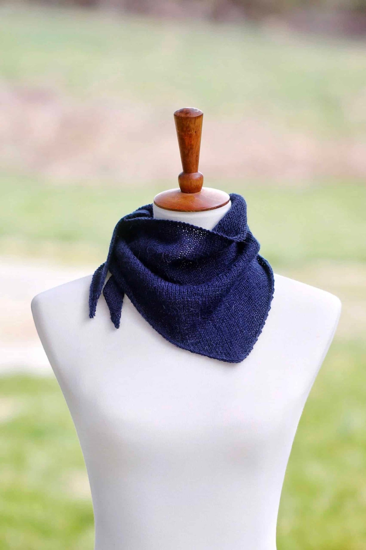 Lightweight triangle kerchief knit pattern showing airy texture and graceful drape