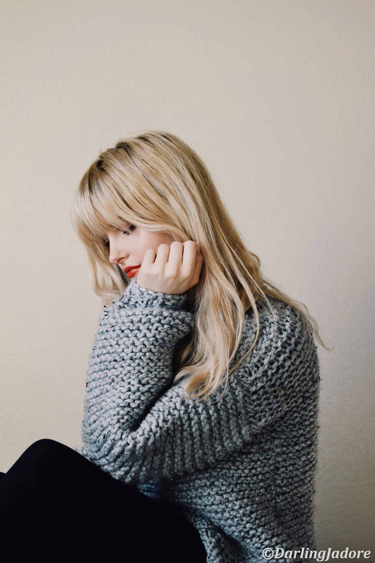 Side view of chunky pullover sweater knitting pattern with classic garter stitch texture