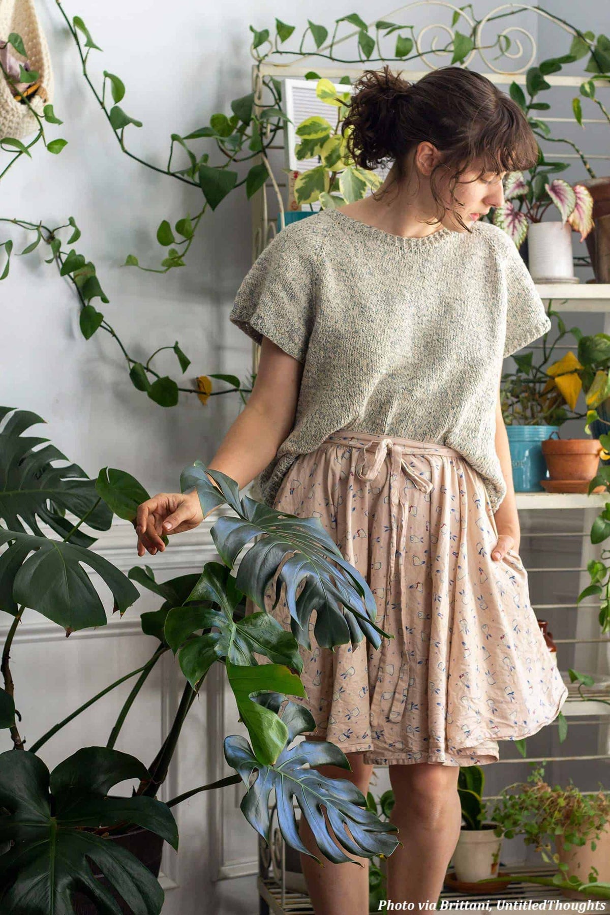 Close-up detail of Classic Tee raglan sleeve construction and relaxed fit