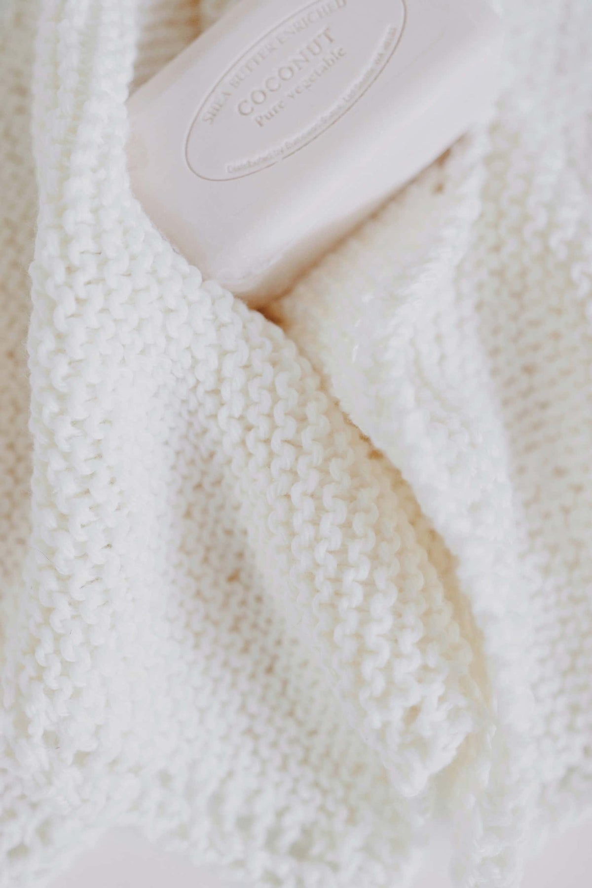 Stack of handknit washcloths in cream cotton - The Country Washcloths easy knitting pattern