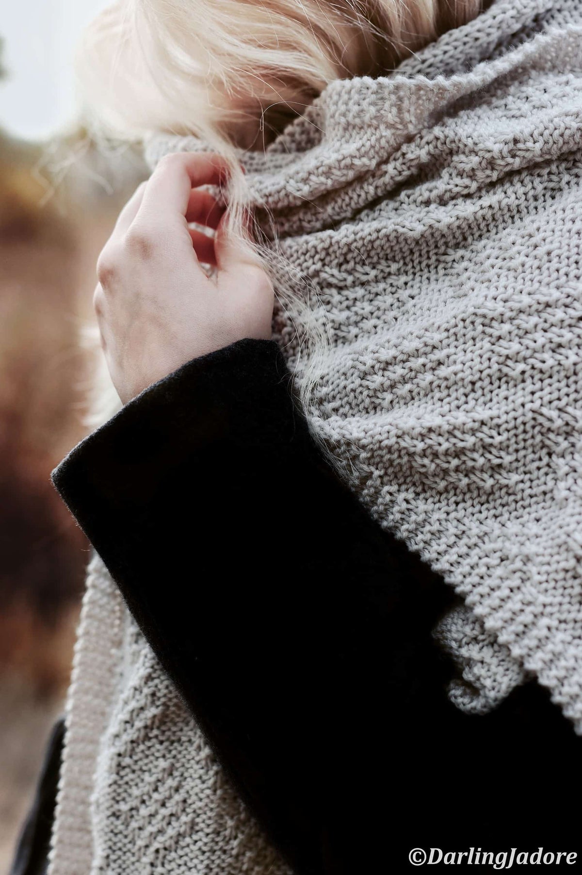 Beginner-friendly wrap scarf knitting pattern styled for cozy winter layering